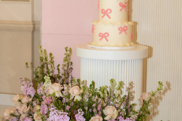 celebration cake and flowers banquet hall